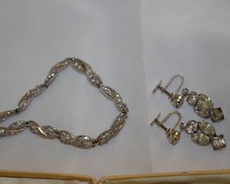 Closeup of rhinestone necklace, bracelet and earrings, Marshall Field & Company Chicago lined presentation box