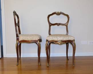 A beautiful pair of antique Louis XV style chairs