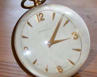 Tiffany & Company Paperweight table clock, c. 1965,
acrylic, brass, enameled brass