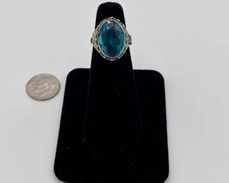 Sterling silver ring with blue stone, possibly topaz