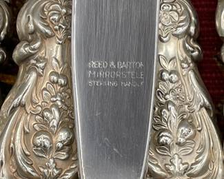 Closeup of Reed & Barton Mirrorstele Francis I pattern sterling silver handle flatware