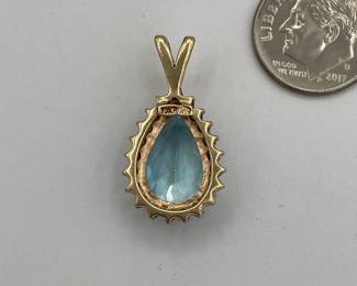 Reverse of the 10k gold and topaz pendant