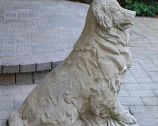 Side view of outdoor / garden cement statue of dog