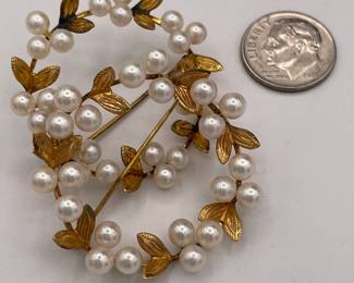 Closeup of 14k gold and cultured pearl brooches / scarf pins 
