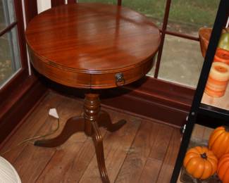 1 of 2 matching barrel top tables mahogany