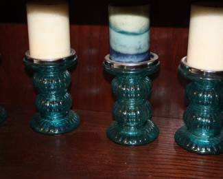 4 aqua candle holders w/candles