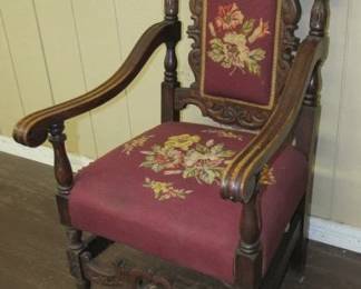 Carved Oak Needlepoint Arm Chair