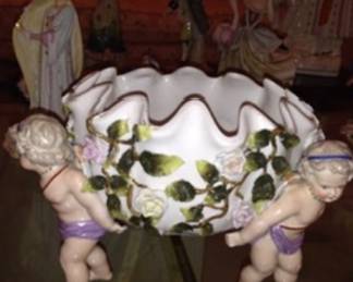 Porcelain handmade cherub carried bowl