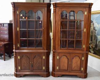 Pair of Mahogany Mirrored Pair of Corner Cabinets
By: Councill Craftsmen