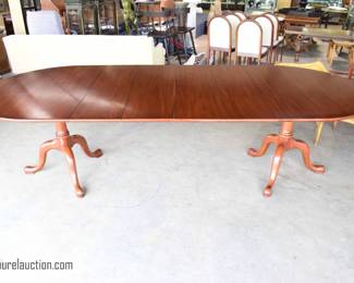 Cherry dining table By: Henkel Harris