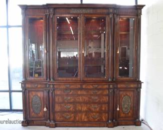 Ormolu Mounted Mahogany 4 Piece Lighted Regency Breakfront
By: Theodore Alexander