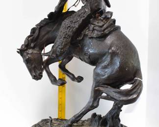 Large Bronze on Marble "The Rattlesnake"
By: Frederic Remington