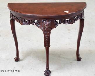 Carved Mahogany Demilune Table
By: Baker Furniture
