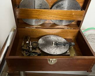 vintage music box with 30+ discs