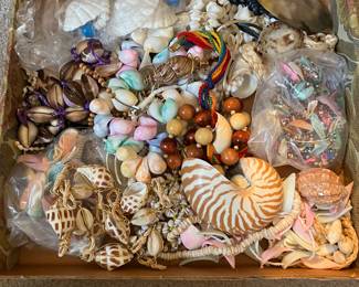 several large shell necklaces