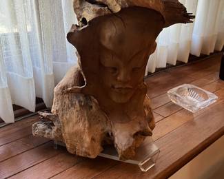 carved driftwood figure