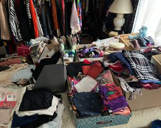 lots of scarves, pashminas, gloves, accessories 