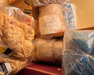 Closet full of yarn and magazines for knitting projects. Wool, cottons, etc. 