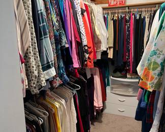 closets full of women's clothes from the 1970s to present