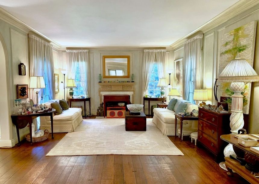 Incredibly gorgeous home in the heart of Old Highland Park, Dallas!  Oushak rug, armless down sofas, Mackenzie Childs discontinued floor lamp.  This is an amazing room!