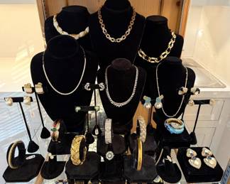 Diamond tennis necklace on paper clip chain, Neiman Marcus vintage platinum & diamond necklace, 18k snake bracelet, 18k cuff….zoom in on the photo.  All real and all waiting for that special Holiday outfit!