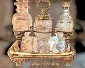 Sterling cruet set with original cut glass crystal