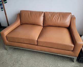 Leather and chrome loveseat