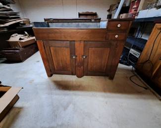 Very early dry sink with lift lid over tinned sink. c-1830