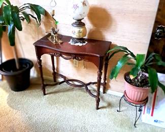 Antique stand and lamps, plus the plants.
