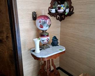 Victorian marble top table and other collectibles.