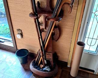 Victorian cane holder and some canes.