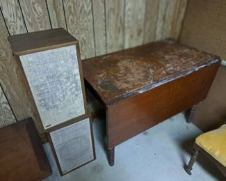Antique cherry drop leaf table and pair stereo speakers.