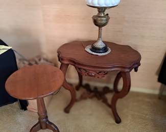 Antique candle stand, Victorian walnut center table and antique lamp
