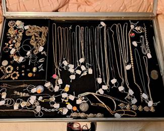 Gold and sterling silver chains, bracelets, necklaces and other gold items.