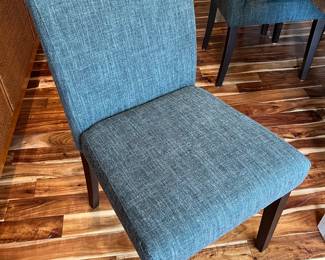 Closer look at one of the six chairs by Jason Furniture Co., to be included with dining table.
