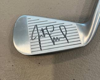 Closer look at Justin Leonard’s signature on the face of the two-iron.