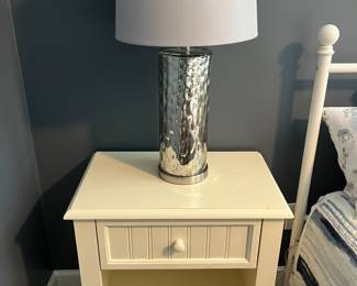 Nightstand; nice selection of lighting.