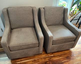 Pair of upholstered swivel easy chairs E & E Co.