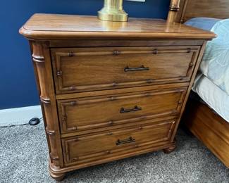 One of two matching “Tommy Bahama” nightstands by Magnussen.