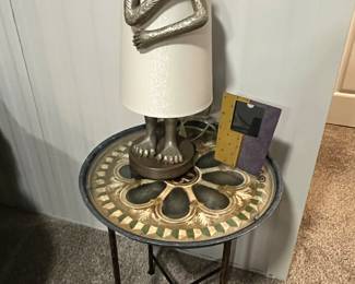 Occasional/accent table with glass surface; ape/monkey table lamp.