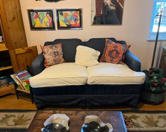 There are 2 of these loveseats. The fabric is different on each one. 