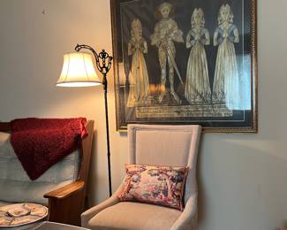 There are a pair of these cream chairs.
Brass rubbings on black paper