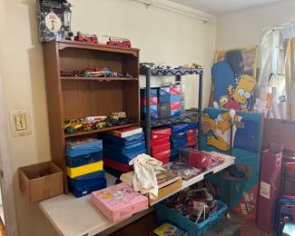 Hundreds of old hot wheels and matchbox cars