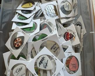 Hundreds of concert guitar picks for all sorts of bands like. Ozzy, anthrax, metallica, AC/DC, ace freely metallica.