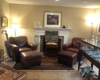 Pair of designer leather club chairs