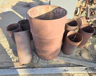 2530  55 Gal Drum and 6 Cut Steel Pipes 