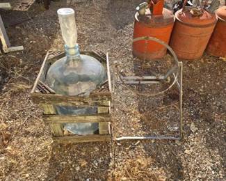 1088  5 Gal Glass Water Jug with Wooden Create and Metal Stand 