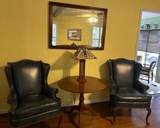 Leather chairs, table, lamp, mirror