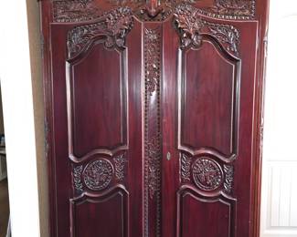 Beautiful Ornate Armoire great for storage,  it's all shelving inside.