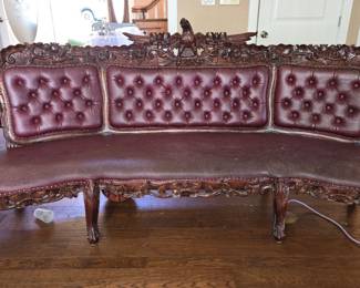 Ornate Mahagony Couch with Carved Eagle on top.